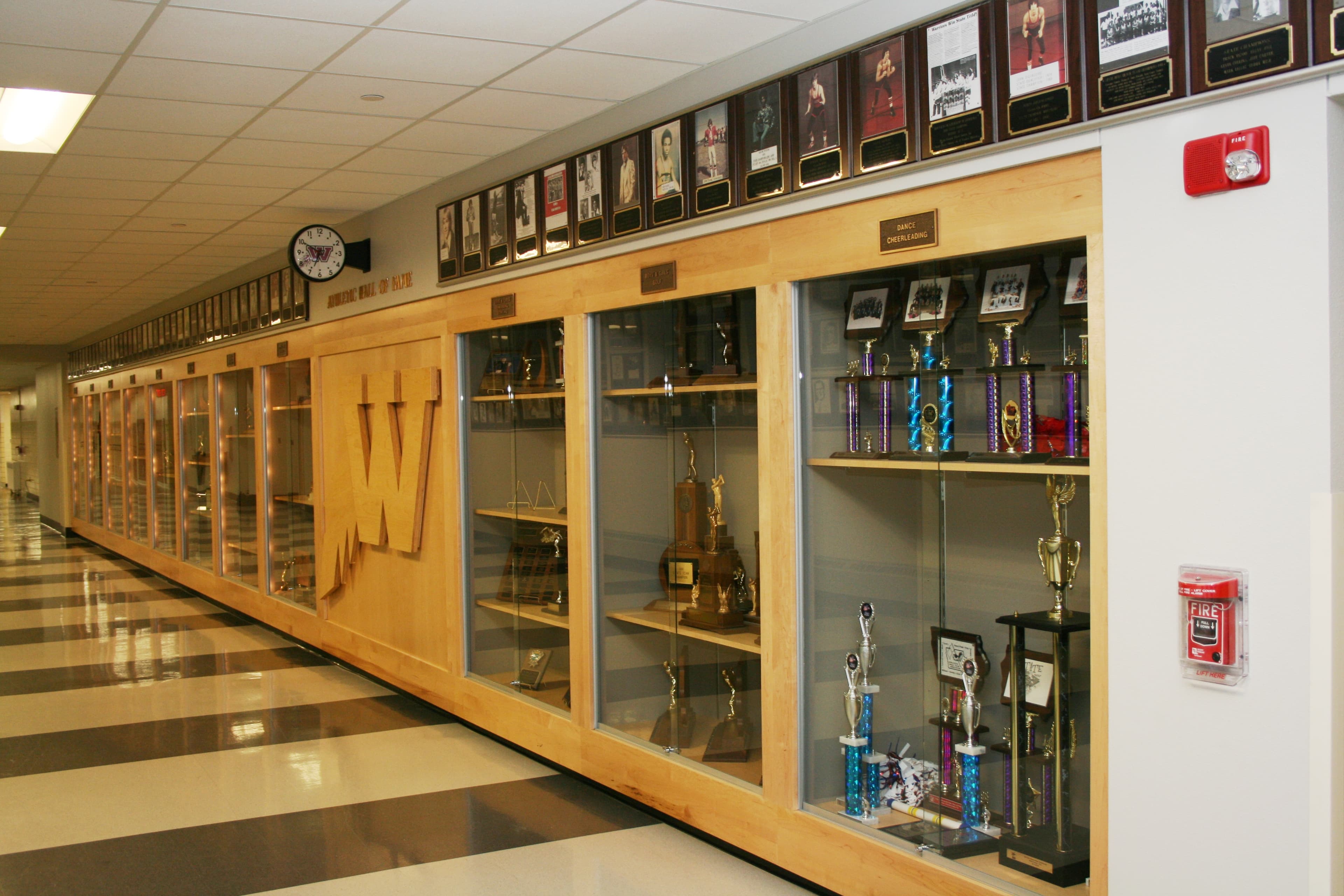 Waterloo West Athletic Hall of Fame hallway and display cases